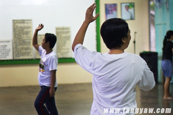 Government employees practicing a traditional dance number for an upcoming program