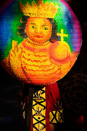 The image of the Sto. Nino, Cebu's icon, is painted on a <strong>bilao</strong> as part of a prop during a Sinulog performance