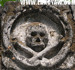 Skull and crossbones medallion at facade of Calamba cemetery