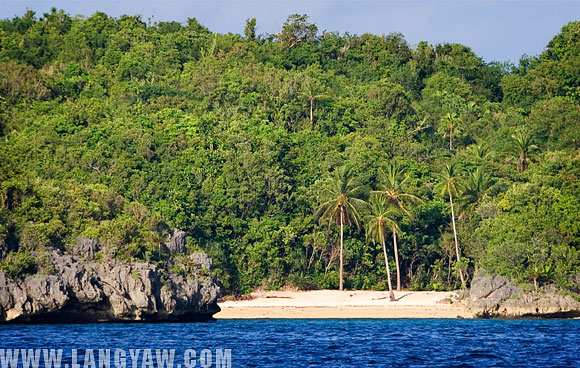 A secluded white sand beach in one of the islets that dot the sea.