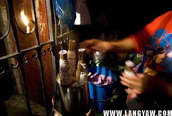 Puto bumbong steamer at the gates of the church