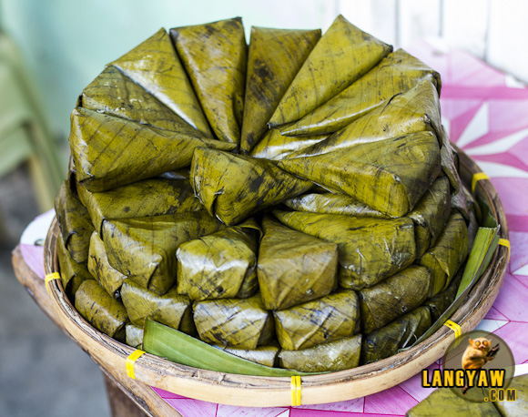 A pile of suman, a type of native rice cakes. I really stopped and bought one to taste and eat. 