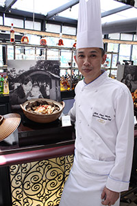 Executive Chinese Chef Mok Chee Wah: slow cooked chicken with Chinese herbs wrapped in lotus leaf