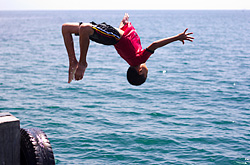 A lad having a good time at Olutanga's wharf