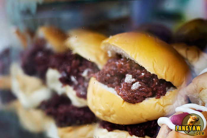 Burger buns with "puto maya" which is equivalent to biko in Cebu