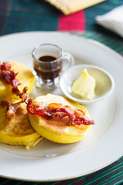 Free breakfast of pancake, bacon and chocolate syrup. 