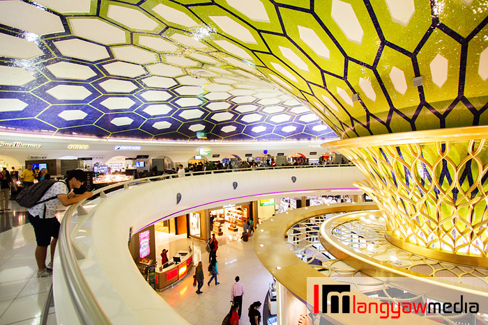 Ringing around the 'bloom' if I may say, are duty free shops at the lower floor, more shops, restaurants and passage to boarding gates and other parts of the airport