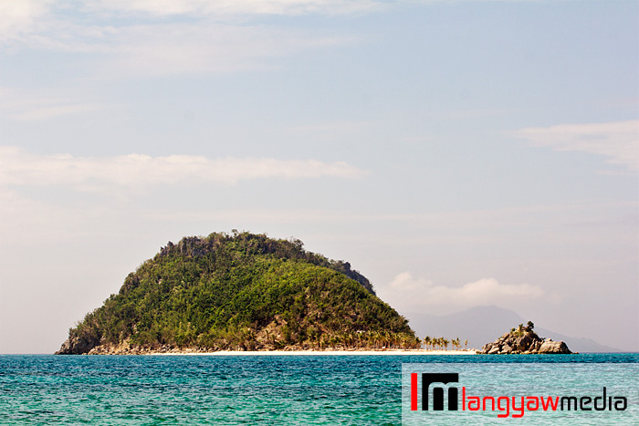 Cabugao Dako islet as seen from Bantigue Island and sandbar. Taken with a super telephoto lens.