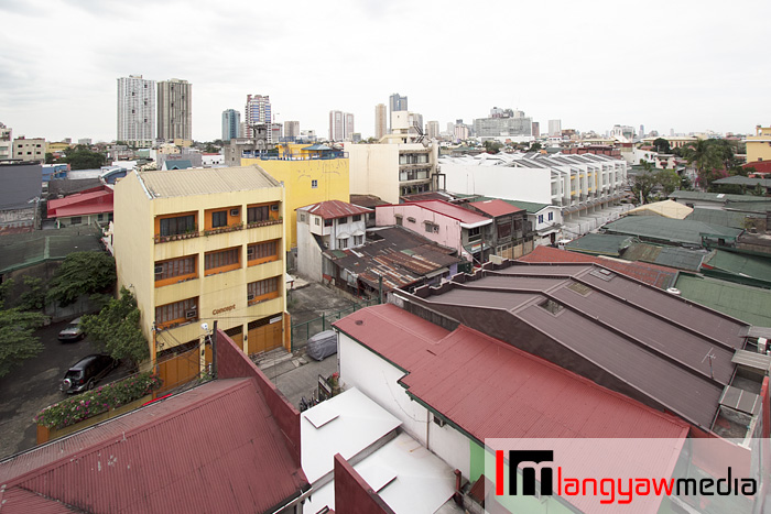 View from the window are residences and buildings 