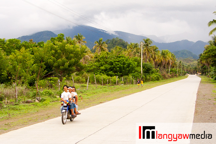 A habal-habal plies the highway in Gov. Generoso in Davao Oriental with the newly inscribed UNESCO World Heritage Site, Mt. Hamiguitan Range Wildlife Sanctuary