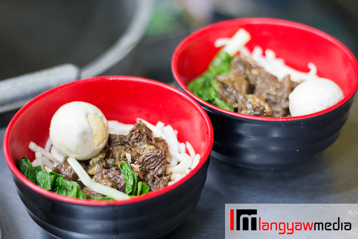 Beef noodle soup with hand pulled noodles and marbled eggs