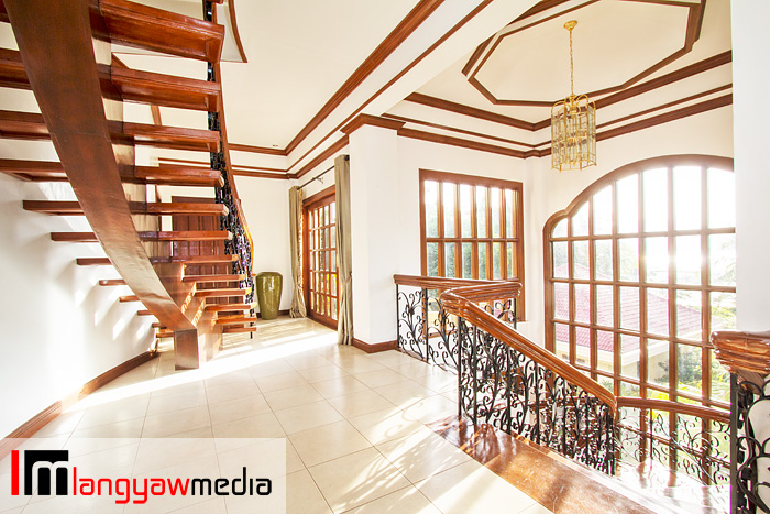 Second floor of mansion with the stairs leading to the penthouse