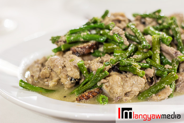 Pork with string beans and cooked in coconut milk