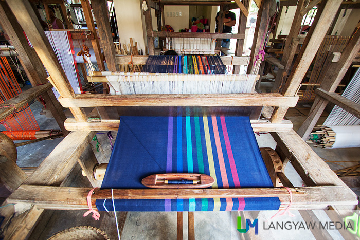 Colorful cloth being woven