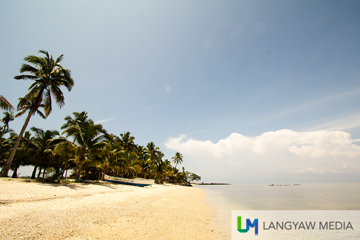 Private beach at mid afternoon