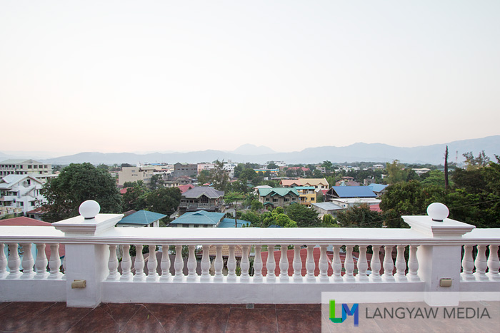 Veranda overlooking the capital town of Bangued with the Sleeping Beauty mountain in the background