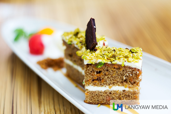 Caramel carrot cake  with pistachio and fruit balls of papaya and watermelon