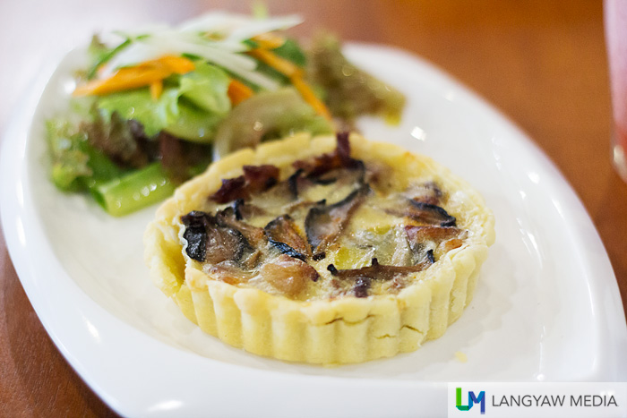 Bacon and mushroom quiche served with side salad 