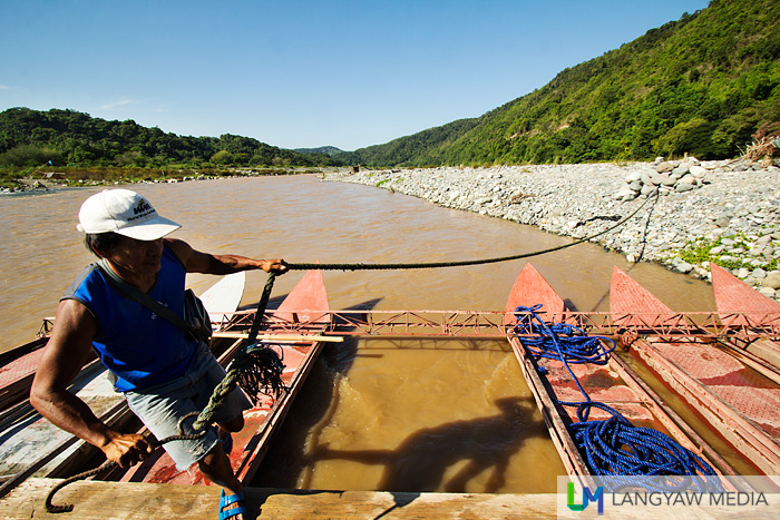 Metal raft that ferries vehicles and people across the Luba River