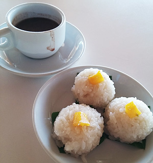 Puto maya with sikwate (steamed sticky rice with mango bits paired with thick hot chocolate)