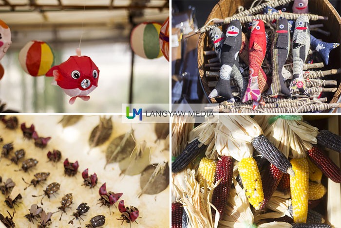 Quirky products that caught my attention, clockwise from top left: decorative stuffed fish, different kinds of corn, insect origami and paper balloons resembling fish