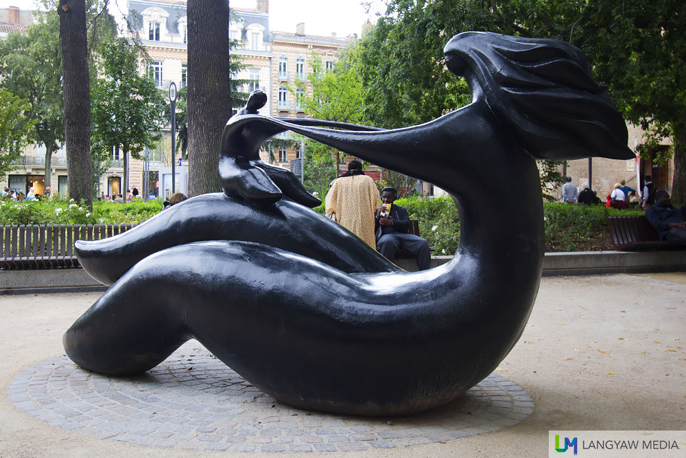 MaternitÃ©e (Motherhood) by Jean Louis Toutain (1948-2008), a local sculpture 