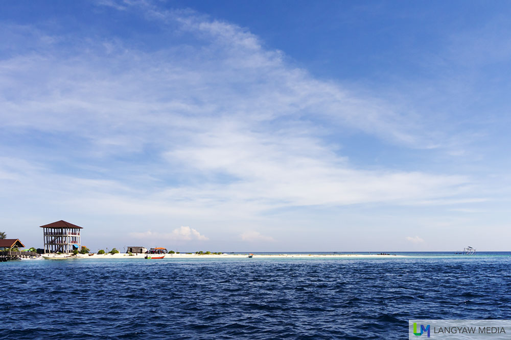 The white sand bar that is Pulau Kodingareng Keke with some structures