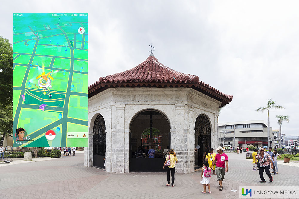 The Magellan's Cross Kiosk. Inset: Screencap of vicinity. The Kiosk marks the location of the gym.