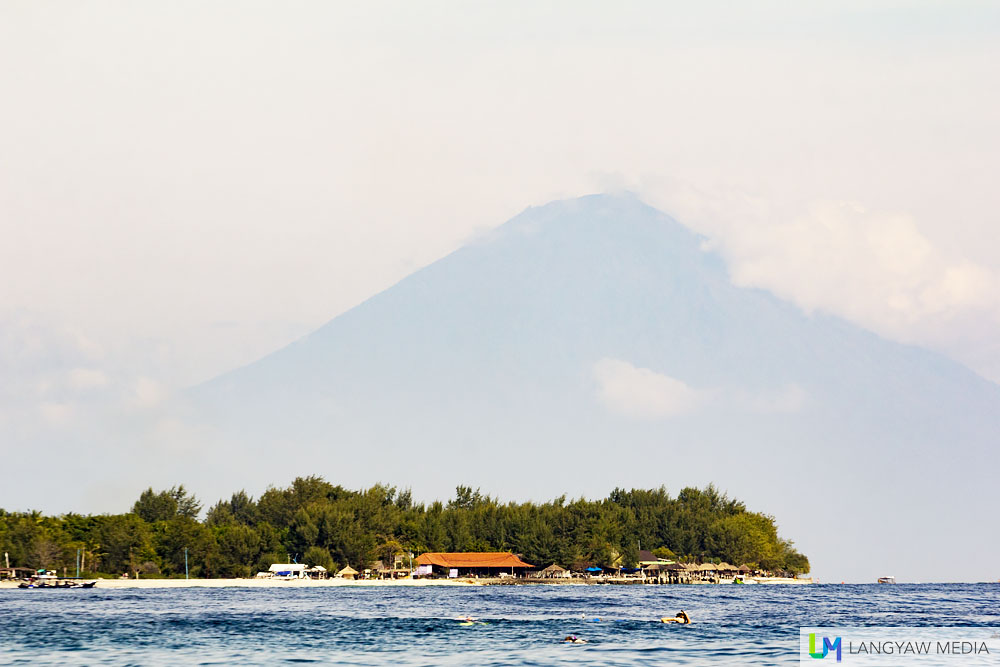 View of Gili Trawangan with Gunung Agung, the highest volcanic mountain in Bali, in the background